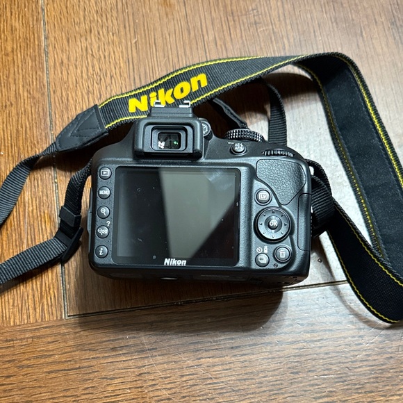 Nikon Black D3400 DSLR with Yellow Accents